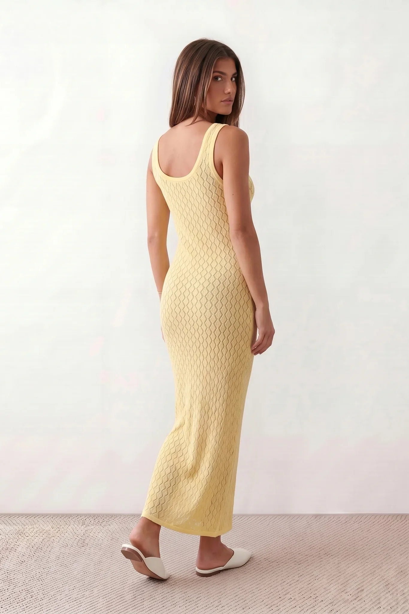 Women’s openwork knit maxi dress with a diamond knit texture, round neckline, wide straps, and sleeveless design for beach and summer wear.