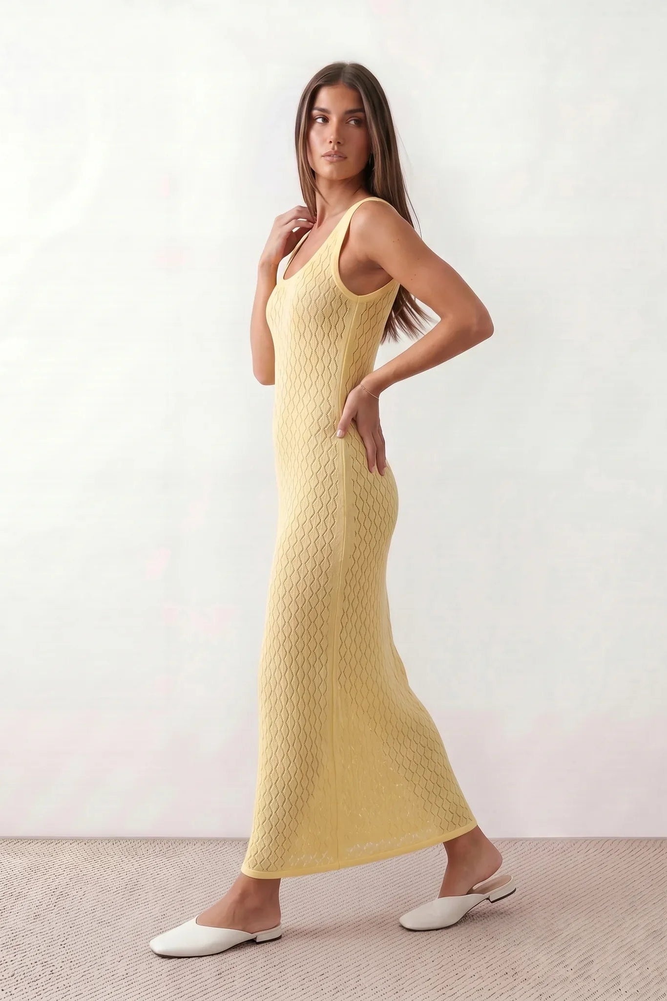 Women’s openwork knit maxi dress with a diamond knit texture, round neckline, wide straps, and sleeveless design for beach and summer wear.