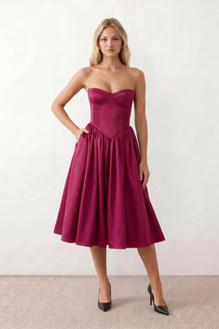 Women's strapless corset midi dress with a structured sweetheart neckline, boned bodice, pintuck basque waist and full pleated A-line skirt, elegant wedding guest and occasion dress.