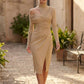 Woman wearing the Asymmetric Neck Open Back Midi Dress featuring an asymmetric mock-neck halter, off-shoulder ruched detailing, long fitted sleeves, an elegant open back, fitted midi silhouette and front slit, styled for weddings, cocktail parties and formal occasions.