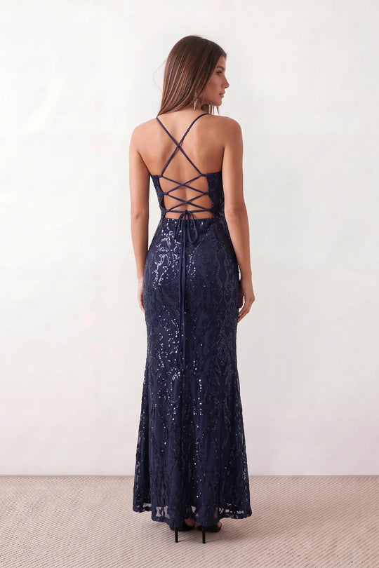 Women's Sequined Spaghetti Strap Maxi Dress in a full-length trumpet silhouette with all-over shimmering sequins, square neckline, delicate spaghetti straps, adjustable lace-up back, and elegant front slit, designed for weddings, proms, black-tie events, and formal evening occasions.