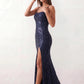 Women's Sequined Spaghetti Strap Maxi Dress in a full-length trumpet silhouette with all-over shimmering sequins, square neckline, delicate spaghetti straps, adjustable lace-up back, and elegant front slit, designed for weddings, proms, black-tie events, and formal evening occasions.