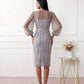 Women's Letitia fitted embroidered knee-length wedding guest dress featuring intricate all-over embroidery, delicate bead embellishments, sheer bodice panels, a round neckline, detachable waist belt, fitted sheath silhouette, scalloped hem, and concealed back zip fastening.