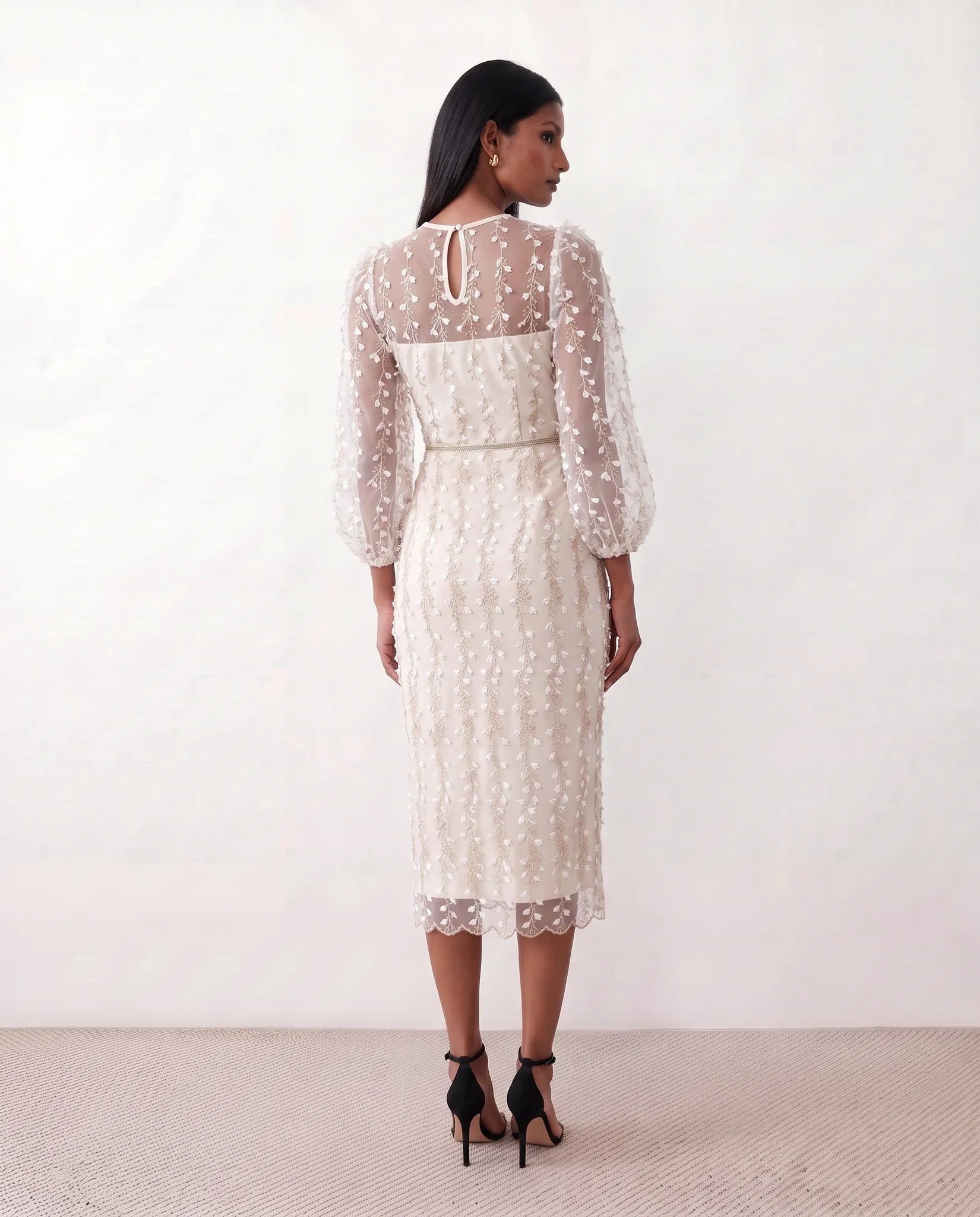 Women's Letitia fitted embroidered knee-length wedding guest dress featuring intricate all-over embroidery, delicate bead embellishments, sheer bodice panels, a round neckline, detachable waist belt, fitted sheath silhouette, scalloped hem, and concealed back zip fastening.