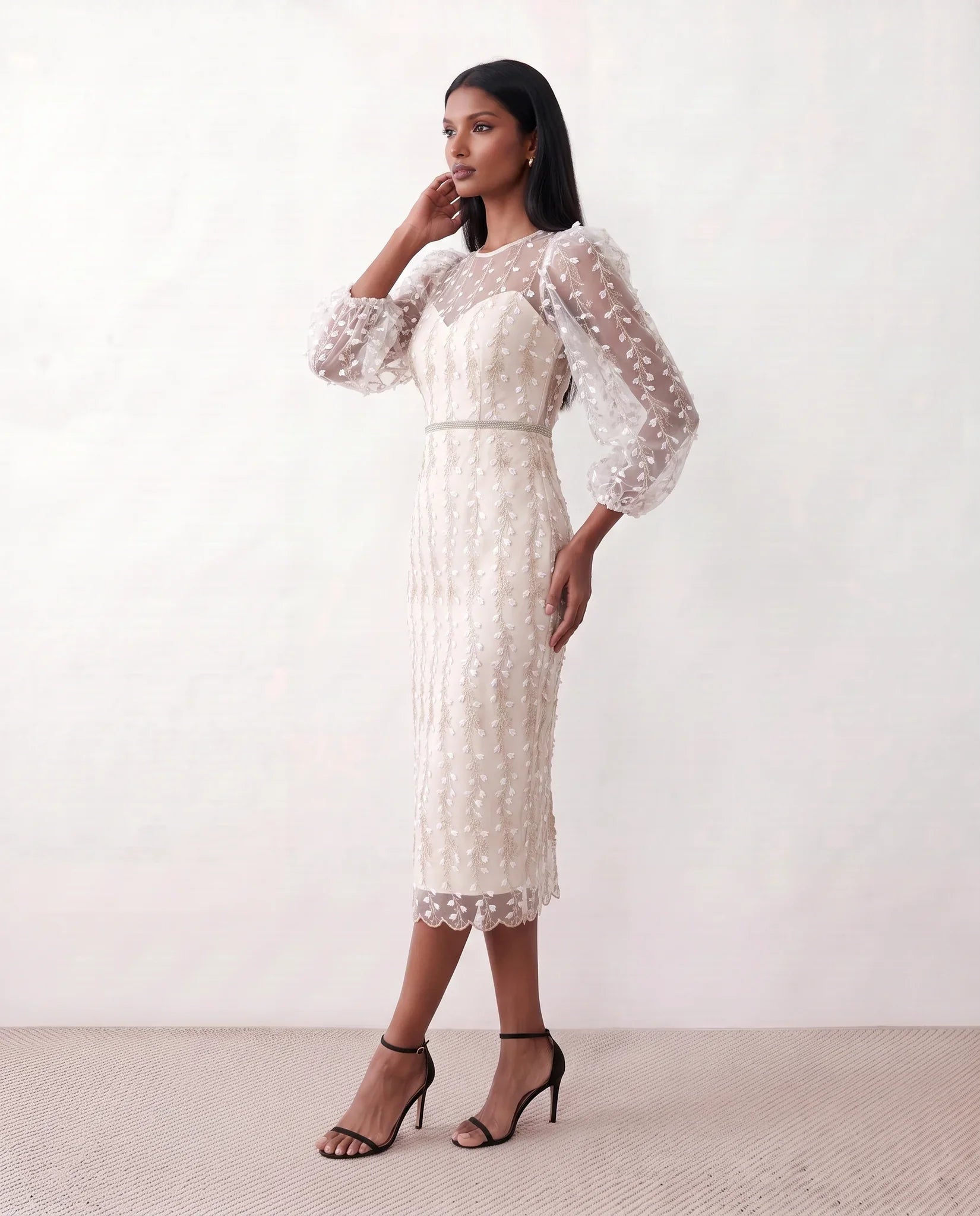 Women's Letitia fitted embroidered knee-length wedding guest dress featuring intricate all-over embroidery, delicate bead embellishments, sheer bodice panels, a round neckline, detachable waist belt, fitted sheath silhouette, scalloped hem, and concealed back zip fastening.