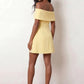 Leni strapless off-shoulder mini dress featuring a Bardot foldover neckline, centered bow detail, twist-front bodice with princess seam shaping, and a flared A-line mini skirt for cocktail parties, weddings, and special occasions.