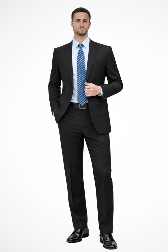 Man wearing a black suit with a blue tie on a white background