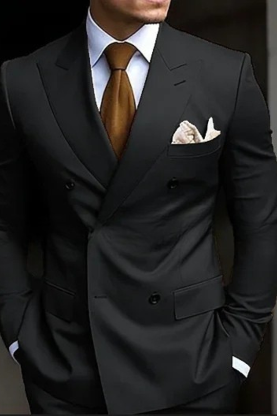 Black suit with a brown tie and pocket square on a dark background