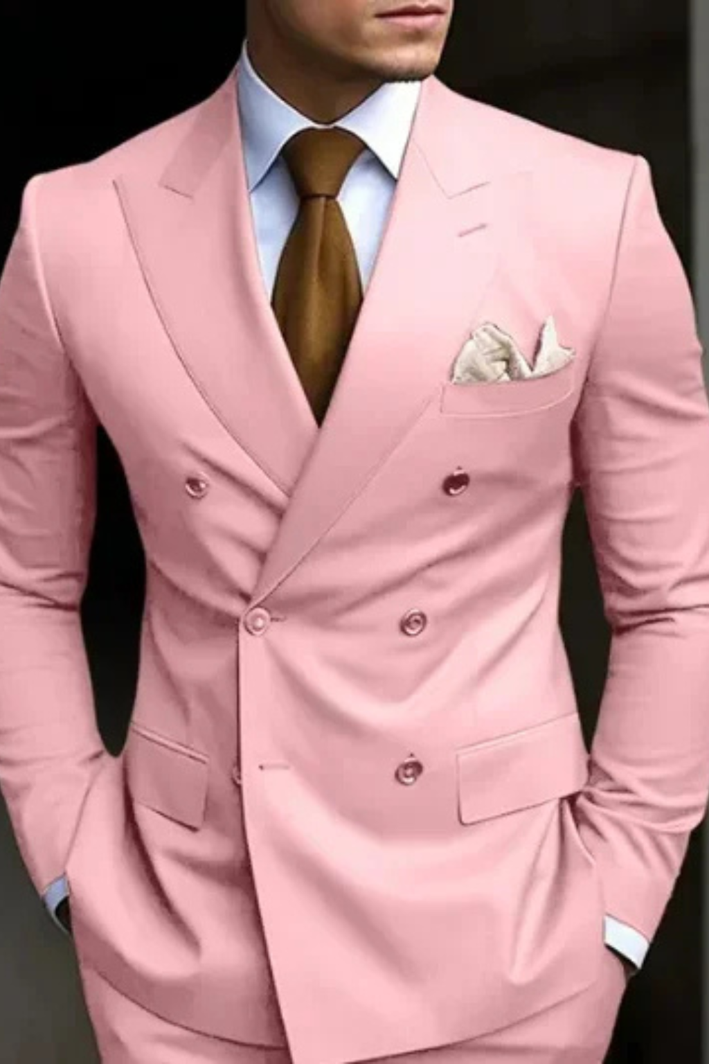 Pink suit with a brown tie and white shirt on a black background