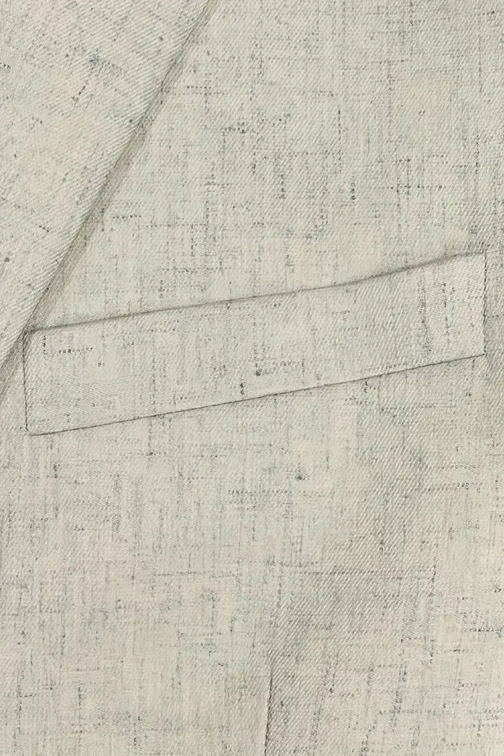 Close-up of a textured fabric with a geometric pattern