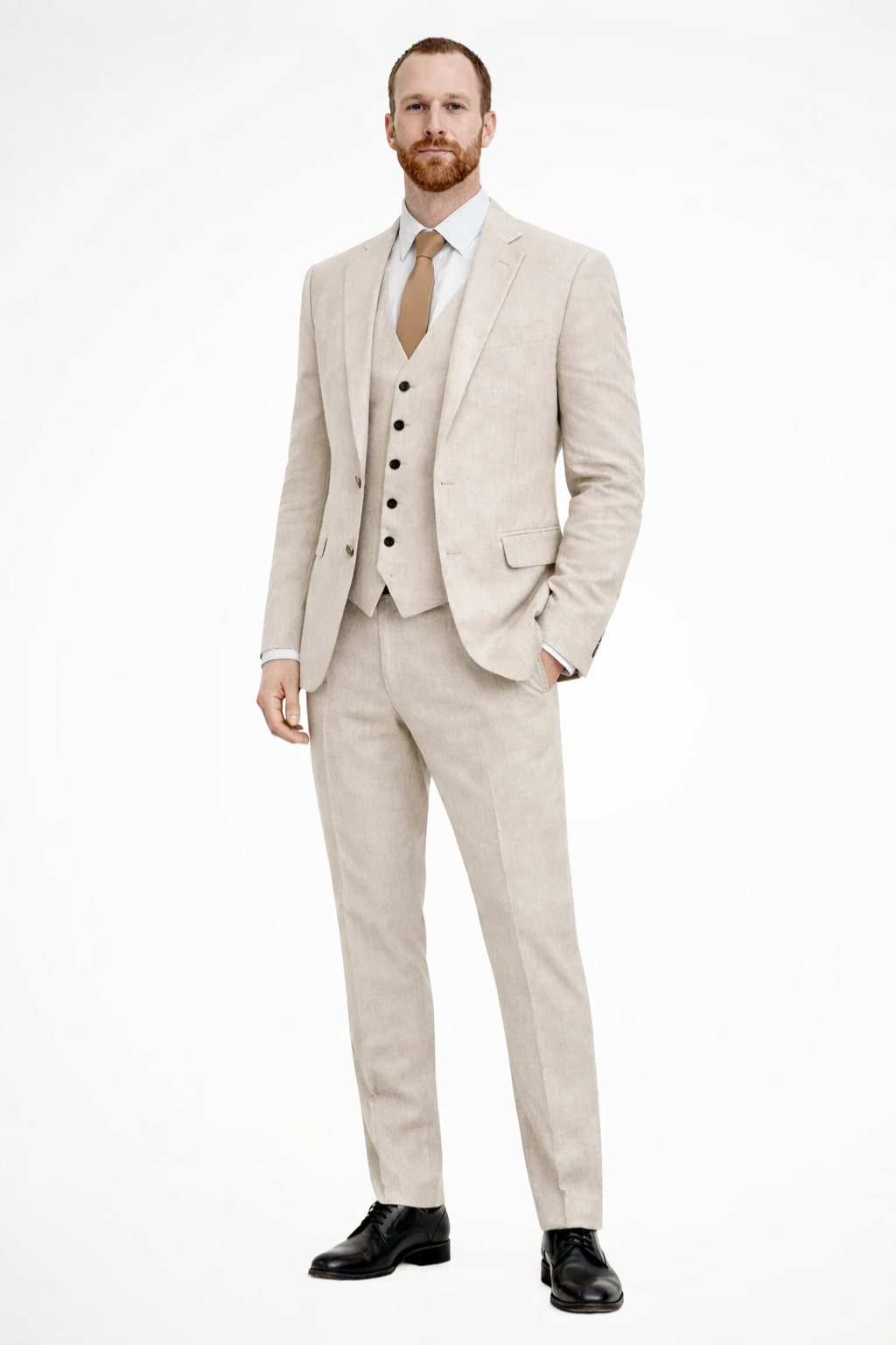 Man wearing a beige suit with a white shirt and brown tie on a white background