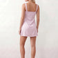 Women's Anahi lace slip mini dress featuring a sweetheart neckline, floral lace bustier with adjustable centre tie, low back, wide shoulder straps, and a satin-look A-line mini skirt, ideal for weddings, parties, and evening occasions.