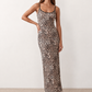 Women's Anika leopard print spaghetti strap low back maxi dress with a slim sheath silhouette, round neckline, adjustable straps and a floor-length straight hem.