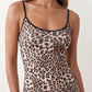Women's Anika leopard print spaghetti strap low back maxi dress with a slim sheath silhouette, round neckline, adjustable straps and a floor-length straight hem.