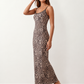 Women's Anika leopard print spaghetti strap low back maxi dress with a slim sheath silhouette, round neckline, adjustable straps and a floor-length straight hem.