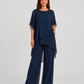 Women's chiffon-style two-piece set featuring an asymmetrical layered top and flowing wide-leg trousers in a relaxed elegant silhouette.