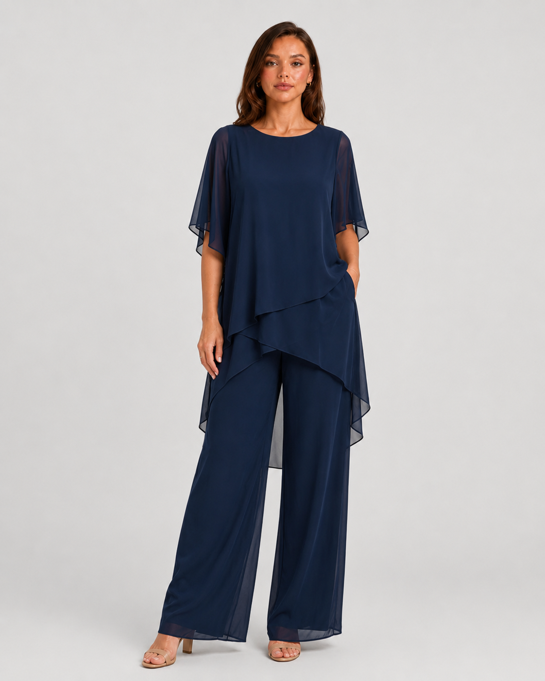 Women's chiffon-style two-piece set featuring an asymmetrical layered top and flowing wide-leg trousers in a relaxed elegant silhouette.