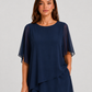 Women's chiffon-style two-piece set featuring an asymmetrical layered top and flowing wide-leg trousers in a relaxed elegant silhouette.