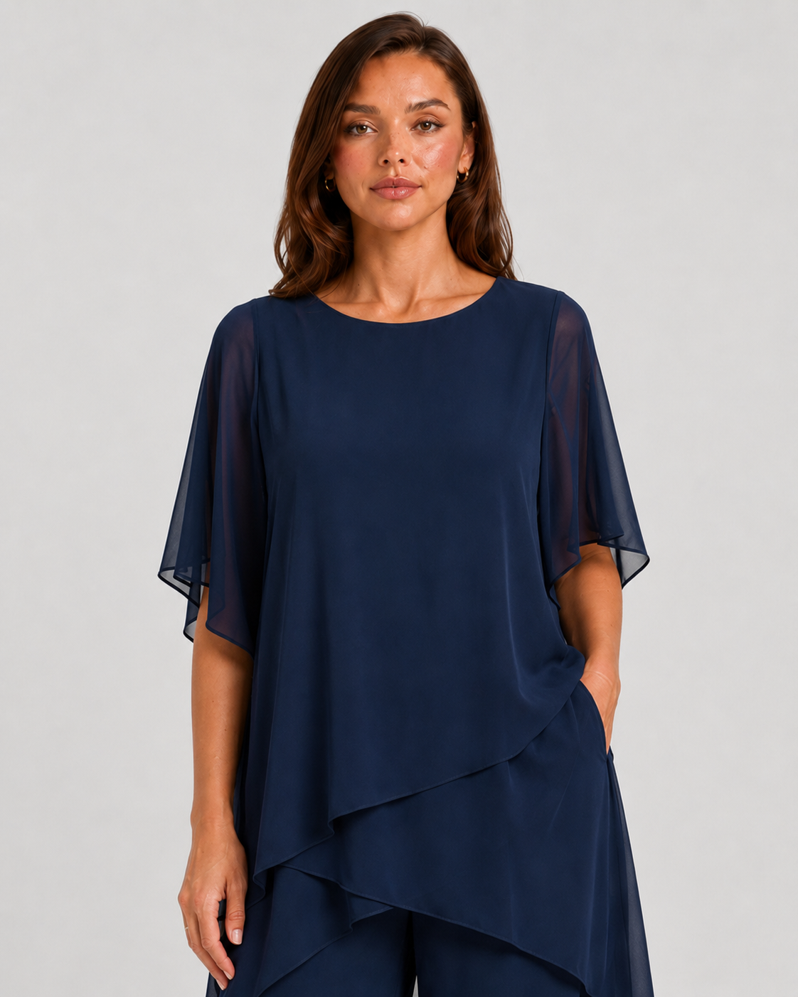 Women's chiffon-style two-piece set featuring an asymmetrical layered top and flowing wide-leg trousers in a relaxed elegant silhouette.