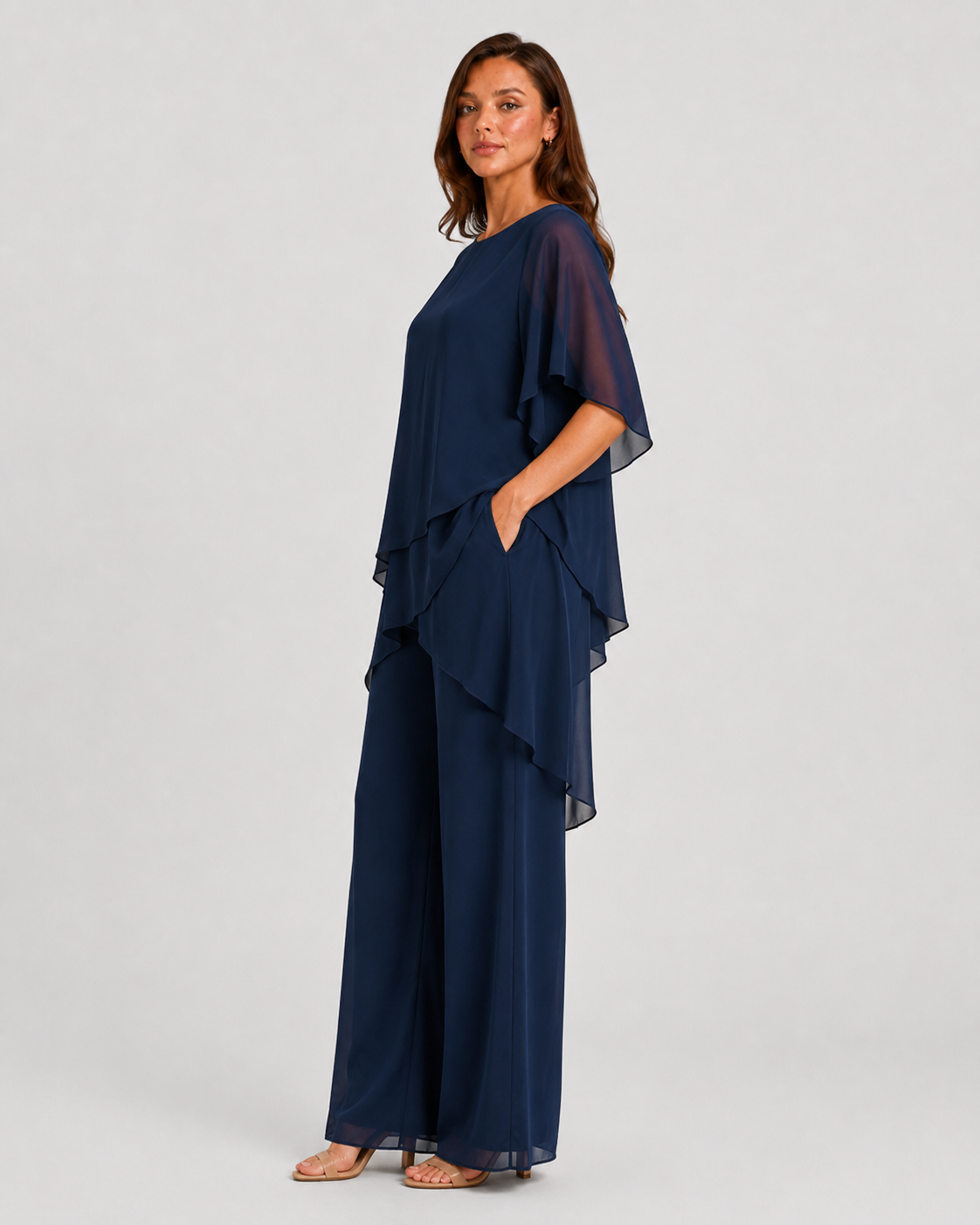 Women's chiffon-style two-piece set featuring an asymmetrical layered top and flowing wide-leg trousers in a relaxed elegant silhouette.