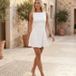 Maraea fitted sleeveless mini dress with a boat neckline, structured sheath silhouette, smooth finish, straight mini hem, and center back zip closure.