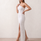 Women's Christa sequined asymmetric neck maxi dress with all-over shimmering sequins, elegant one-shoulder neckline, low open back, fitted silhouette and front thigh split, ideal for weddings, black-tie events, galas and formal evening occasions.