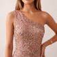 Women's Christa sequined asymmetric neck maxi dress with all-over shimmering sequins, elegant one-shoulder neckline, low open back, fitted silhouette and front thigh split, ideal for weddings, black-tie events, galas and formal evening occasions.