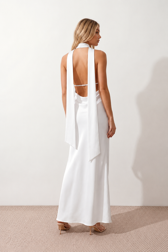 Aleena cowl neck halter maxi dress with a deep draped neckline, fitted halter strap, open back with tie-neck closure, sleeveless column silhouette, and floor-length straight hem in a smooth, elegant finish.