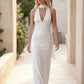 Aleena cowl neck halter maxi dress with a deep draped neckline, fitted halter strap, open back with tie-neck closure, sleeveless column silhouette, and floor-length straight hem in a smooth, elegant finish.