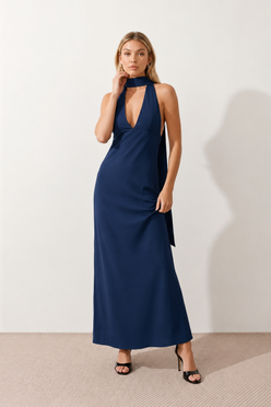 Aleena cowl neck halter maxi dress with a deep draped neckline, fitted halter strap, open back with tie-neck closure, sleeveless column silhouette, and floor-length straight hem in a smooth, elegant finish.