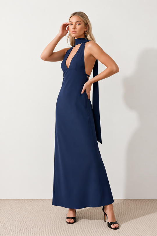 Aleena cowl neck halter maxi dress with a deep draped neckline, fitted halter strap, open back with tie-neck closure, sleeveless column silhouette, and floor-length straight hem in a smooth, elegant finish.
