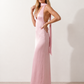 Aleena cowl neck halter maxi dress with a deep draped neckline, fitted halter strap, open back with tie-neck closure, sleeveless column silhouette, and floor-length straight hem in a smooth, elegant finish.