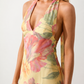 Aleena cowl neck halter maxi dress with a deep draped neckline, fitted halter strap, open back with tie-neck closure, sleeveless column silhouette, and floor-length straight hem in a smooth, elegant finish.