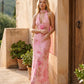 Aleena cowl neck halter maxi dress with a deep draped neckline, fitted halter strap, open back with tie-neck closure, sleeveless column silhouette, and floor-length straight hem in a smooth, elegant finish.
