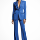 Woman wearing a blue suit on a white background