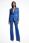 Woman wearing a blue suit on a white background
