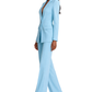 Woman wearing a light blue suit on a white background