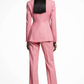 Person wearing a pink suit on a white background
