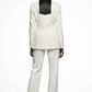 Person wearing a white suit on a white background