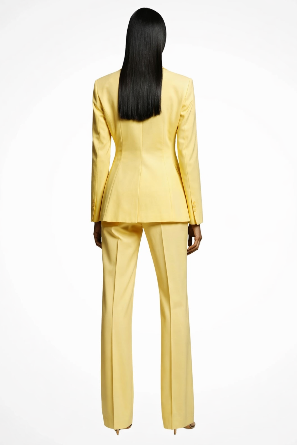 Person wearing a yellow suit on a white background