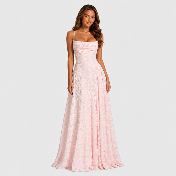 Women's textured floral maxi dress with fitted bodice, delicate shoulder straps, and flowing skirt for elegant wedding guest and formal occasion wear.