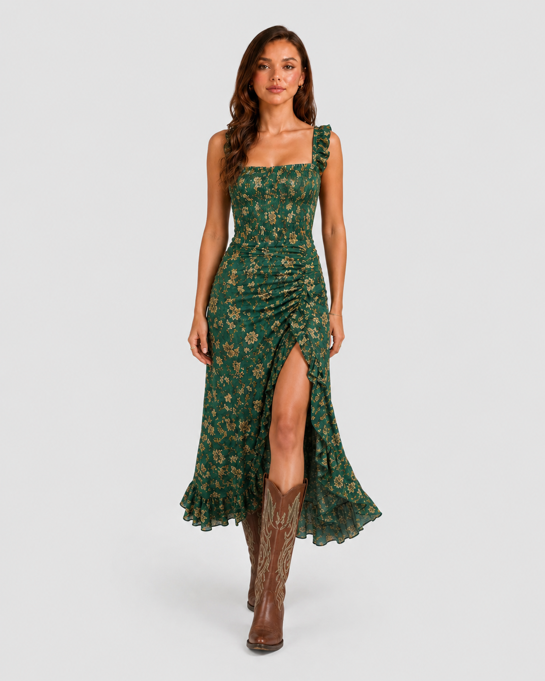 Woman wearing a boho floral maxi dress with a flowing silhouette, side slit detail, and lightweight fabric, styled for a relaxed summer occasion.