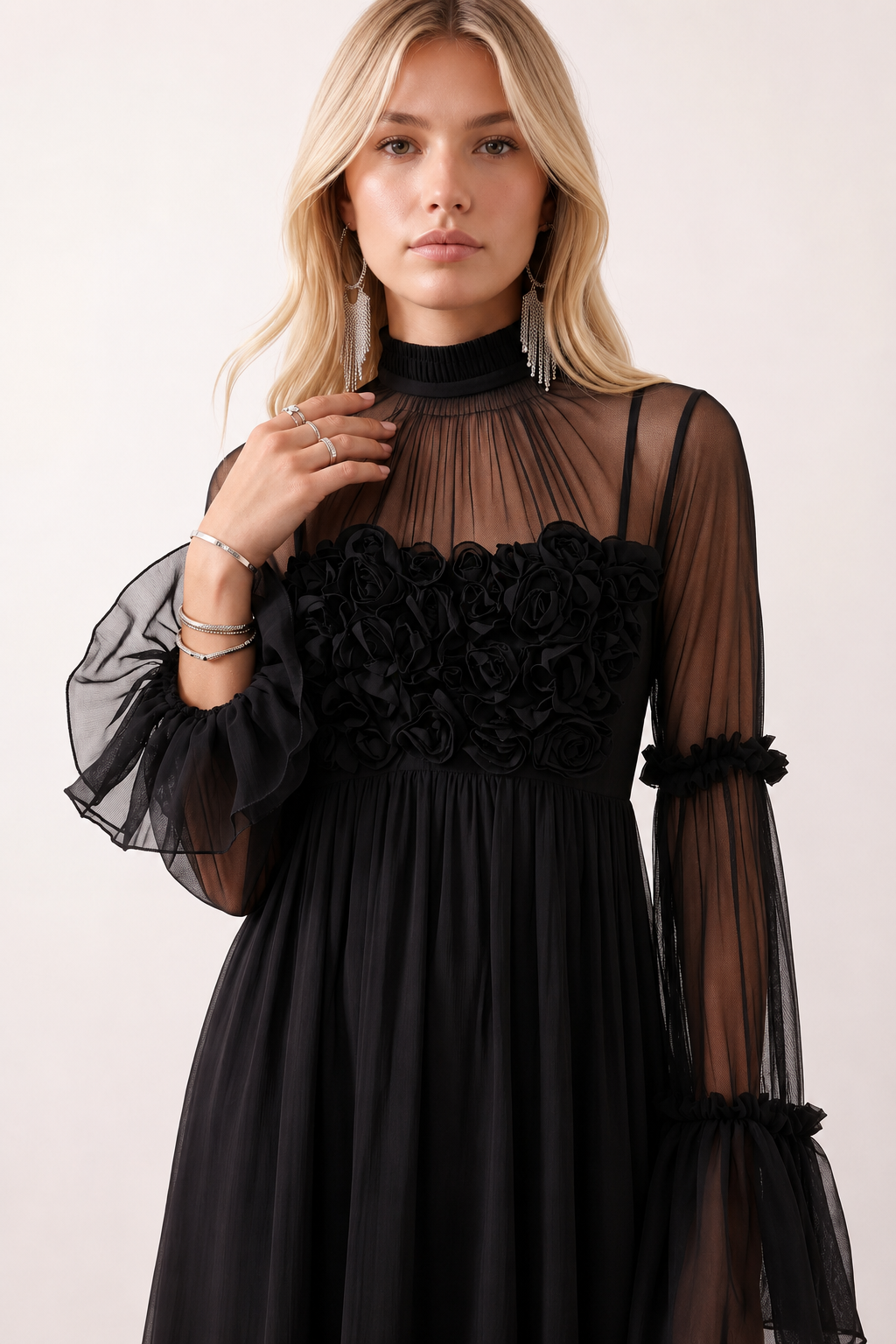 Women's Yasmine Flower Appliqué Mini Dress featuring delicate floral appliqué across the bodice, a sheer mock neckline, ruffled long sleeves, and a flattering skater mini silhouette, ideal for weddings, cocktail parties, race days, and special occasions.