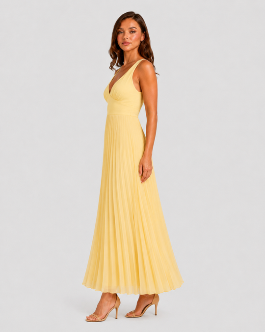 Women's yellow satin-feel pleated maxi dress with defined waist and flowing skirt, elegant occasionwear for weddings, formal events, and summer celebrations.