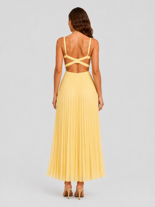 Women's yellow satin-feel pleated maxi dress with defined waist and flowing skirt, elegant occasionwear for weddings, formal events, and summer celebrations.