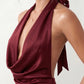 Shop the Women's Georgina Satin Cowl Neck Halter Maxi Dress. Featuring glossy satin, a draped halter neckline, open tie-back design, and a flattering mermaid silhouette, this elegant floor-length gown is perfect for weddings, black-tie events, proms, galas, and special occasions.