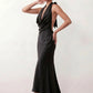 Shop the Women's Georgina Satin Cowl Neck Halter Maxi Dress. Featuring glossy satin, a draped halter neckline, open tie-back design, and a flattering mermaid silhouette, this elegant floor-length gown is perfect for weddings, black-tie events, proms, galas, and special occasions.