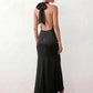 Shop the Women's Georgina Satin Cowl Neck Halter Maxi Dress. Featuring glossy satin, a draped halter neckline, open tie-back design, and a flattering mermaid silhouette, this elegant floor-length gown is perfect for weddings, black-tie events, proms, galas, and special occasions.