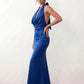 Shop the Women's Georgina Satin Cowl Neck Halter Maxi Dress. Featuring glossy satin, a draped halter neckline, open tie-back design, and a flattering mermaid silhouette, this elegant floor-length gown is perfect for weddings, black-tie events, proms, galas, and special occasions.