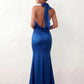 Shop the Women's Georgina Satin Cowl Neck Halter Maxi Dress. Featuring glossy satin, a draped halter neckline, open tie-back design, and a flattering mermaid silhouette, this elegant floor-length gown is perfect for weddings, black-tie events, proms, galas, and special occasions.